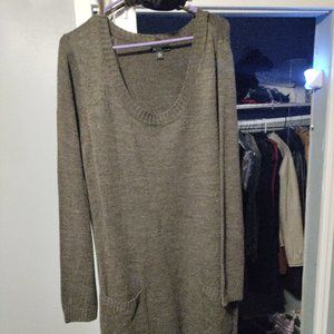 Ladies sweater dress with neck shawl.